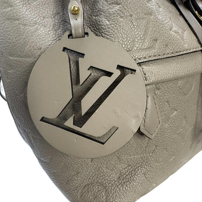 Pre-Owned Louis Vuitton Montsouris Empreinte Leather Backpack (Turtle Dove) LOU.B.1099