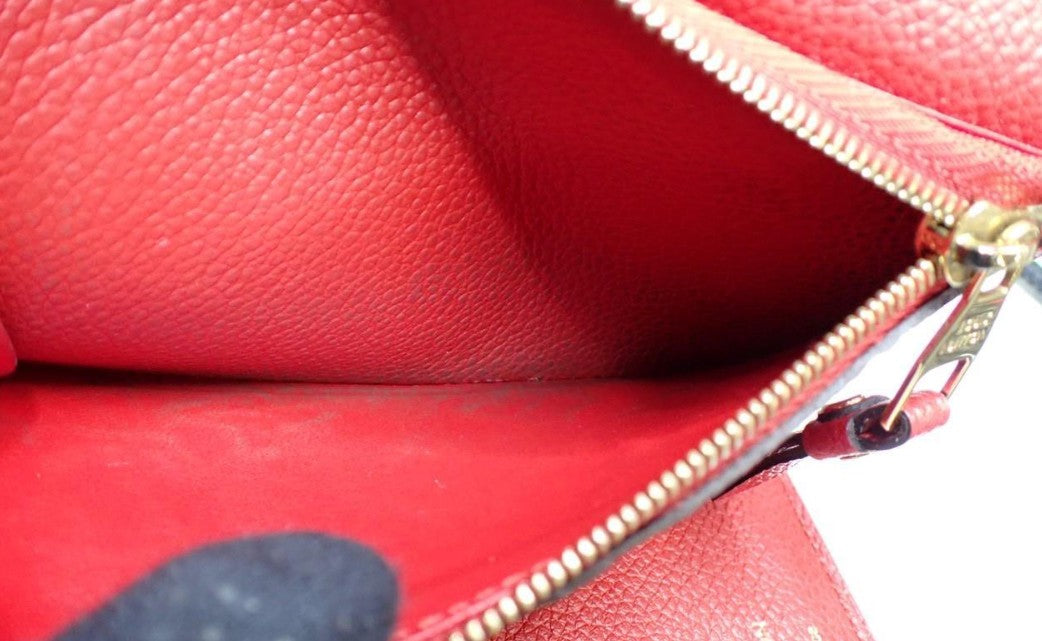 Pre-Owned Louis Vuitton Curieuse Empreinte Leather Wallet (Red) LOU.S.1195