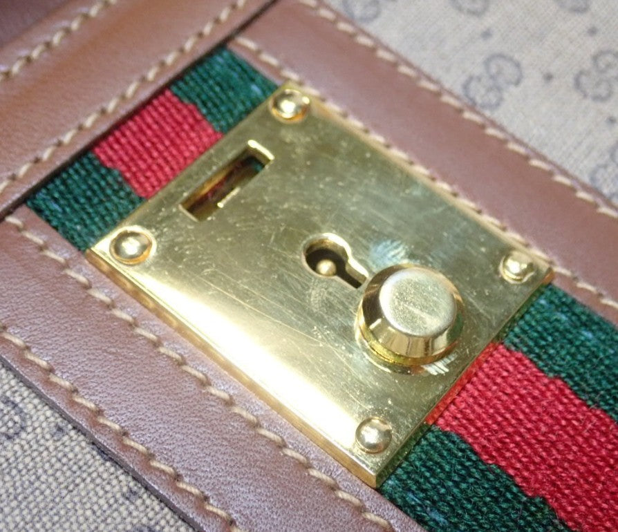 Pre-Owned Gucci Vintage GG Web Canvas Clutch GUC.B.1083